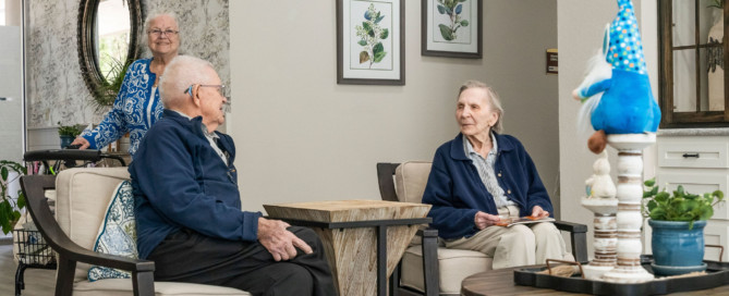 Residents of assisted living community, Sundale Senior Living, enjoying each other's company