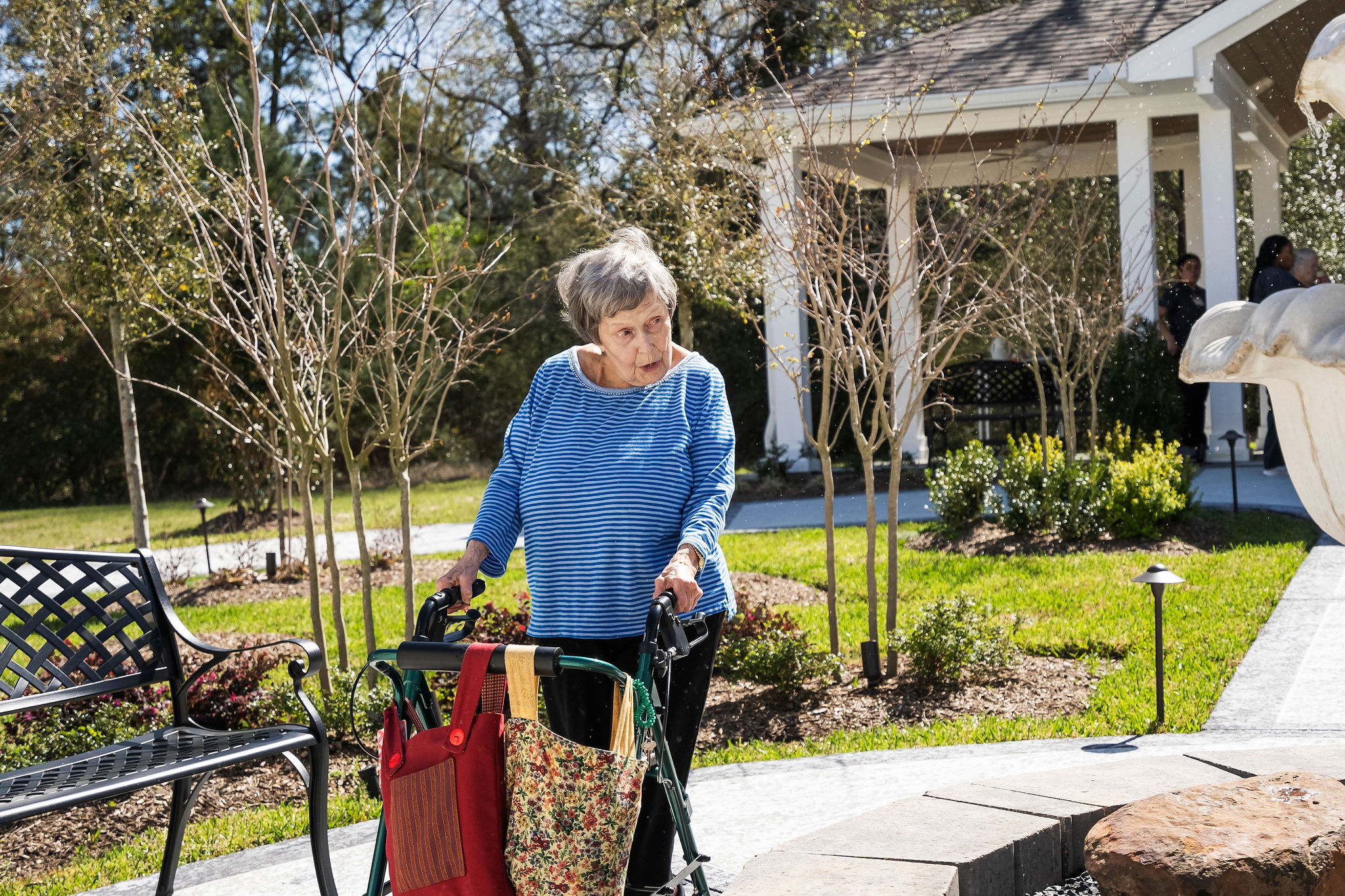 A resident of Sundale Senior Living in Huntsville, TX, takes a stroll on the many walking paths