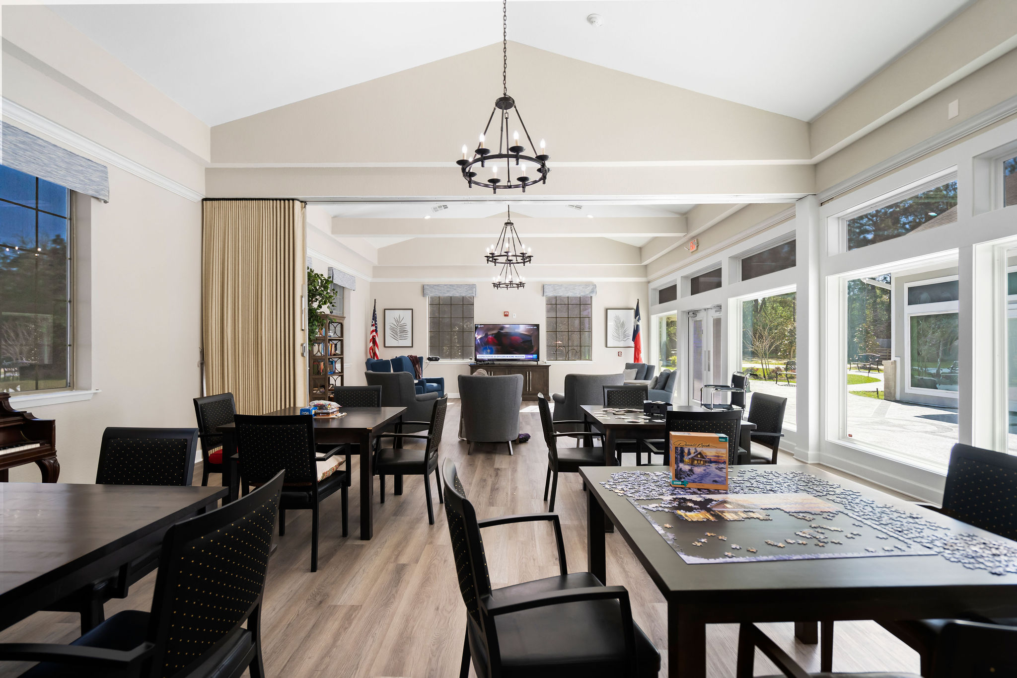 An area where residents can dine, play games, assemble puzzles, and socialize at Sundale Senior Living