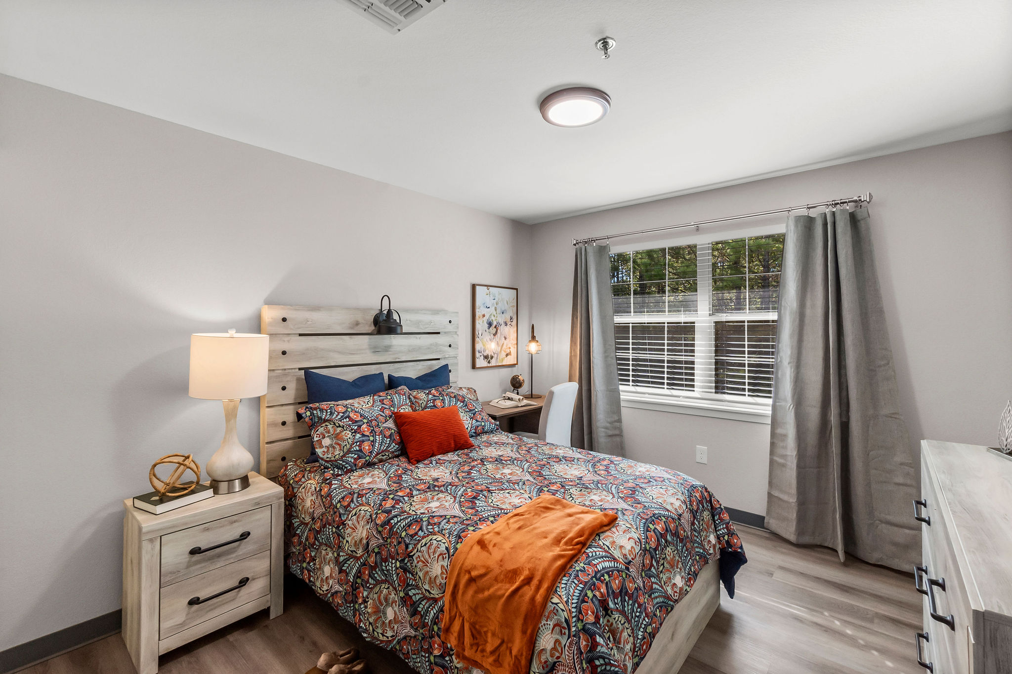 The view of an apartment-style bedroom at Sundale Senior Living in Huntsville, TX